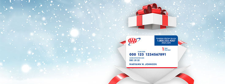 Illustration of a AAA membership card coming out of a gift box set against a snowy background Illustration of a AAA membership card coming out of a gift box set against a snowy background