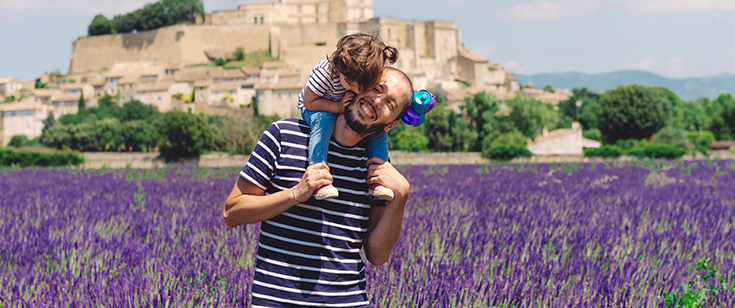 Father with child on shoulders Father with child on shoulders