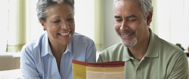 Couple reviewing documents Couple reviewing documents