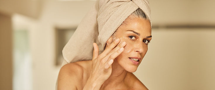 Woman using Clarins Woman using Clarins