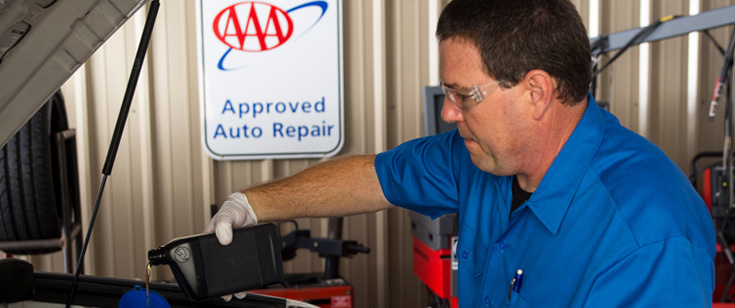 AAR mechanic looking under car AAR mechanic looking under car