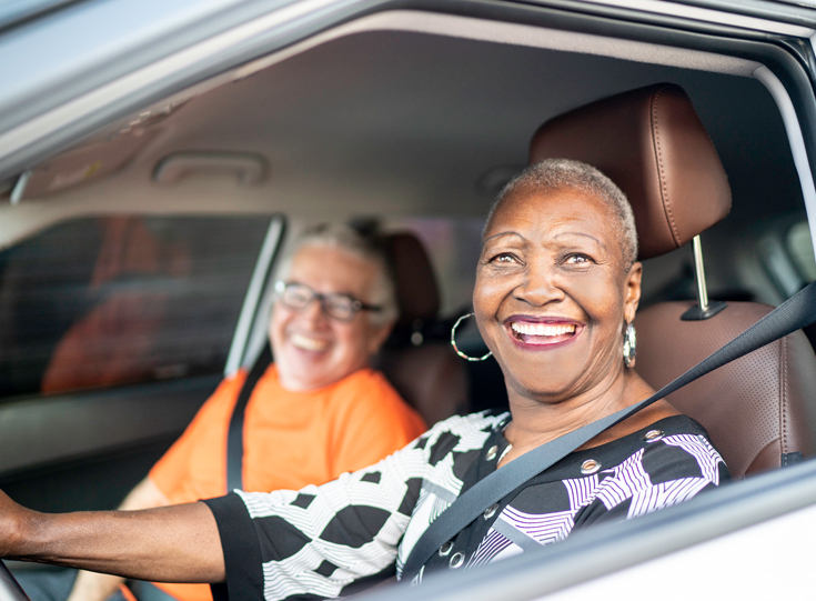 Twom women driving car Twom women driving car