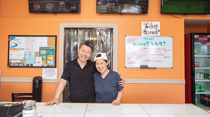 Kyung Han Kim and Cheol Mi Yang at their restaurant Kim Cook