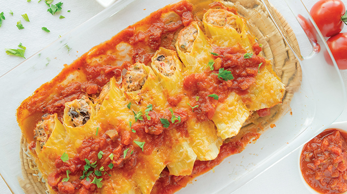 Veronica's Mexican manicotti in a glass baking dish