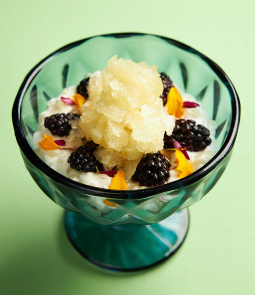 Coconut tapioca topped with mango, blackberries, and yuzu granita