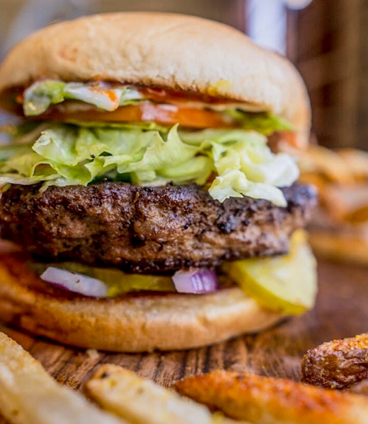 Close-up of a burger patty from Stamps Super Burgers