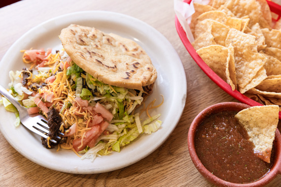 Habanero Cafe beef fajita gordita with a side of chips and salsa.