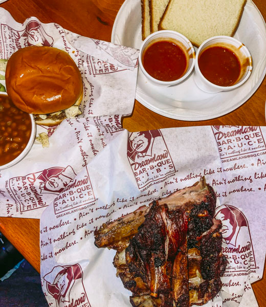 Dreamland Bar-B-Que ribs along with sides of bread and beans