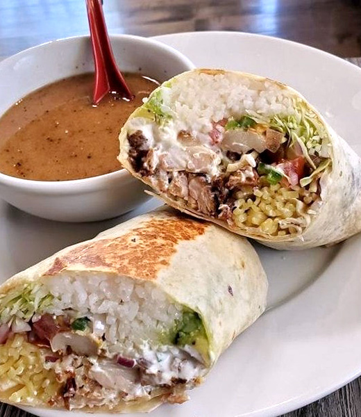 Ramen burrito served with a side of dipping broth
