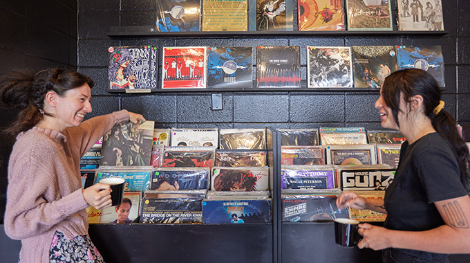 Offbeat Coffee Studio customers browse through records.