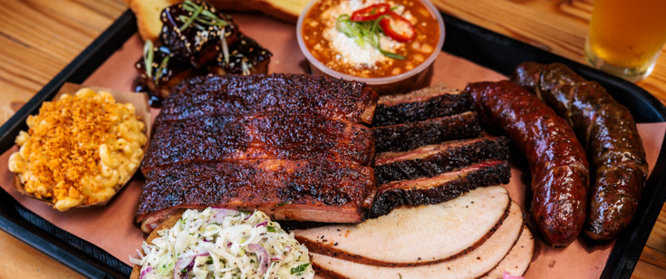 Moo's Craft Barbecue food spread Moo's Craft Barbecue food spread