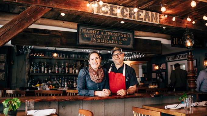 Kate and Jeffrey Fournier inside their restaurant.