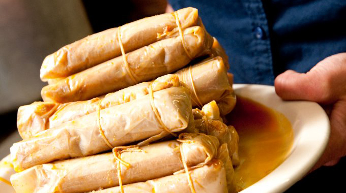 Doe's Eat Place tamales arranged on a plate