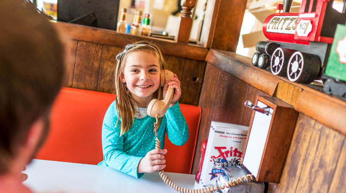 Ordering by phone at Fritz's Railroad Restaurant in Kansas City, Kansas.