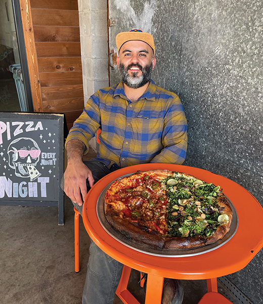 Chef-owner Jaime Fernandez makes pizza from scratch at Black Cat Pizza in Fort Worth. | Photo by June Naylor