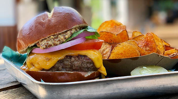 Easy Tiger burger served with a side of chips