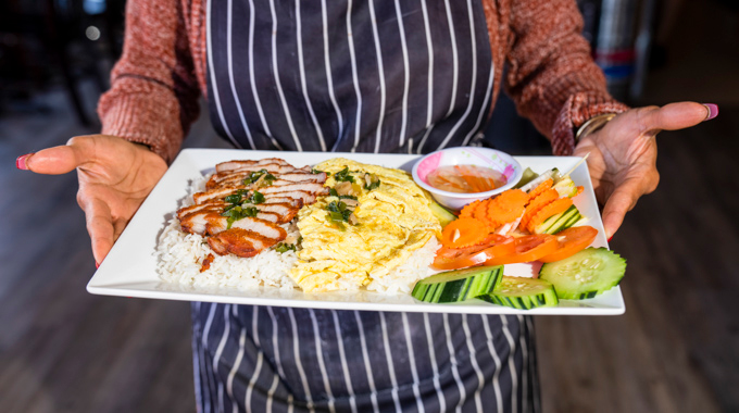 The Khmer Rice Plate with marinated and pan-fried pork and fried egg at Mango Tango.