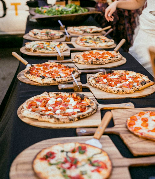 Selection of Bahler Street pizzas on a table.