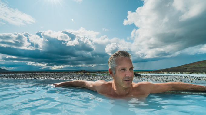 Man soaking in the hot springs