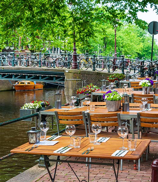 A restaurant by a canal in Amsterdam. |
