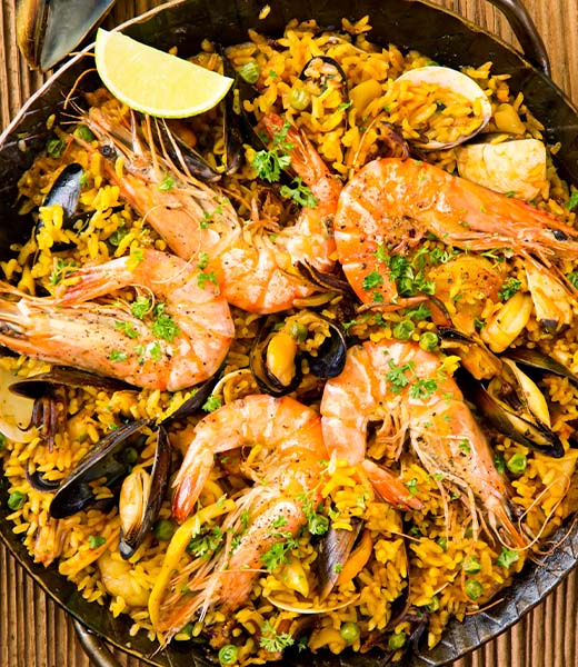 The seafood and rice dish known as arròs in Barcelona. | Photo by HLPhoto/stock.adobe.com
