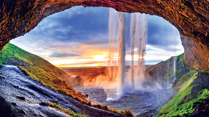 The view behind Seljalandsfoss waterfall. | Photo by Felix/stock.adobe.com 