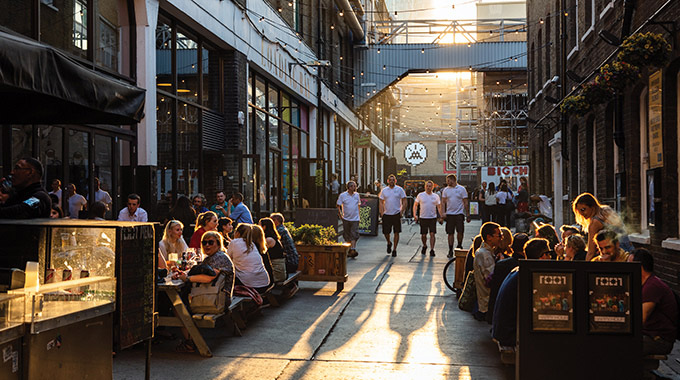 Al fresco dining at the Truman Brewery complex in Spitafields. | Photo by Jon Reid/visitlondon.com