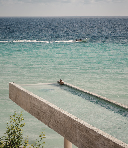 At La Casa de la Playa, the infinity pool is suspended over the ocean.