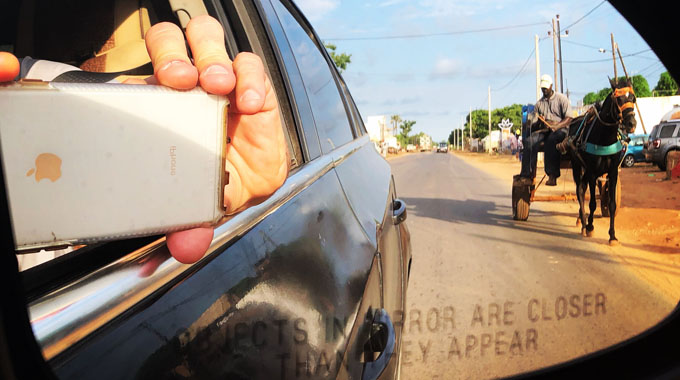 Around Senegal, horse-drawn carts hug the sides of roads.