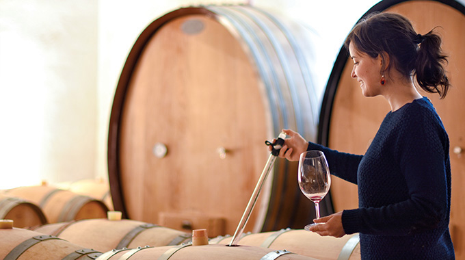 Winemaker Sandra Bravo among the barrels.| Photo courtesy Sierra del Toloño 