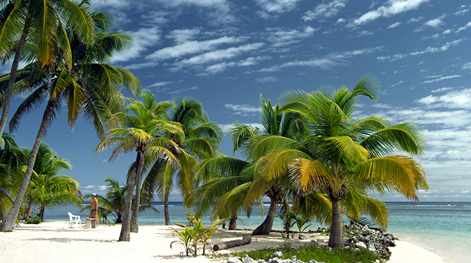 The sugar-white beaches along the Belize coast set the scene for romance. | Photo by Neil McAllister / Alamy Stock Photo