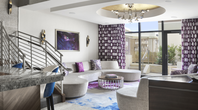Seating area at the base of the stairs inside a suite
