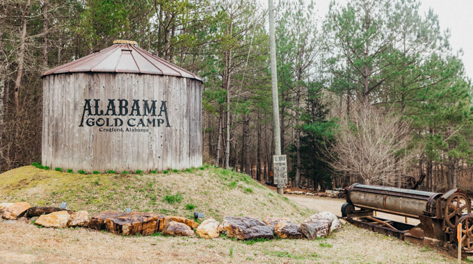 Silo labeled Alabama Gold Camp