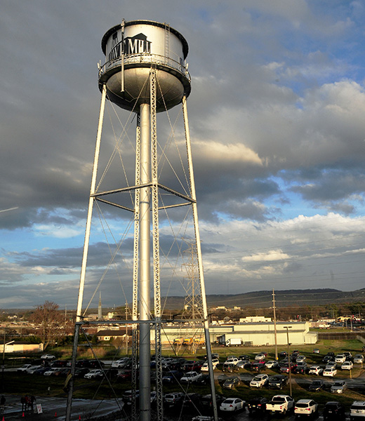 A water tower looming over the Lowe Mill arts complex