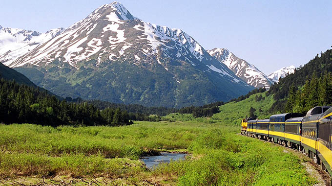 The gorgeous Alaskan wilderness as seen from the last car of this train, on the way to Denali National Park.