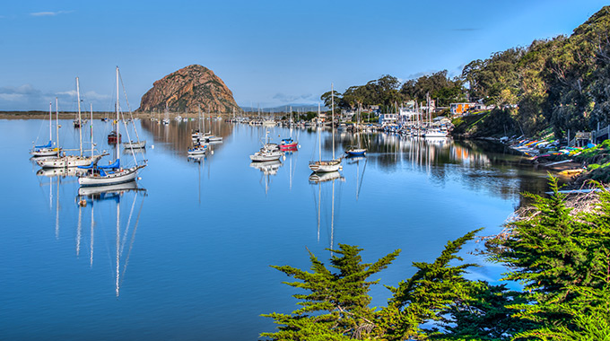 Boats in Morro Bay Harbor, with Morro Rock in the background