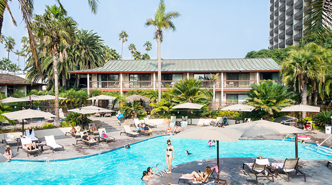 Part of the Catamaran resort surrounds the pool.