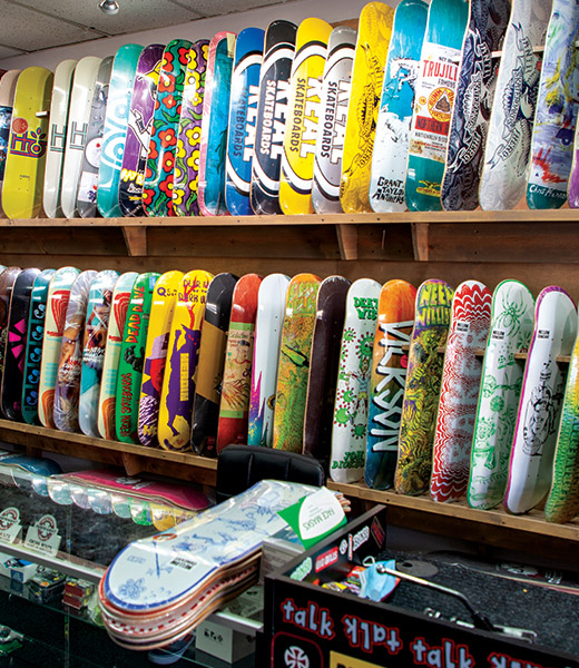 A wall disply of skateboard decks