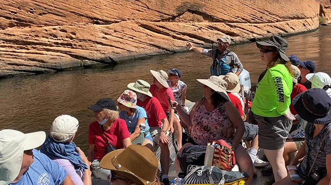 Tour group takes a boat ride on the Colorado River.