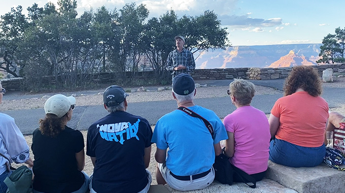 Tourgoers get a geography lesson at the South Rim of the Grand Canyon