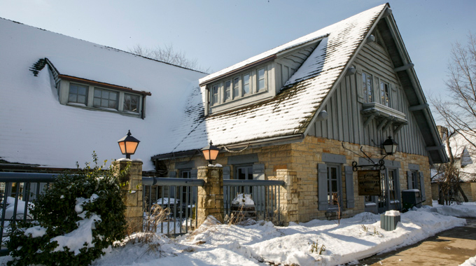 Snow covering the roof and walkways at Pere Marquette Lodge 