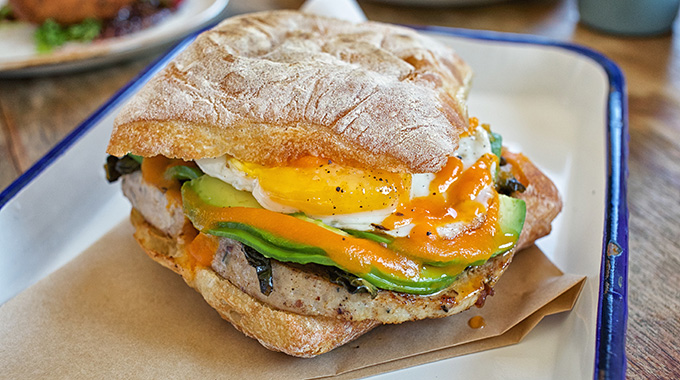 This breakfast sandwich is among Chef Williamson’s creations.| Photo by Ryan Tanaka