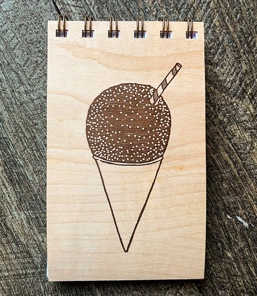 Stacey Nomura notebook with a shave ice design.