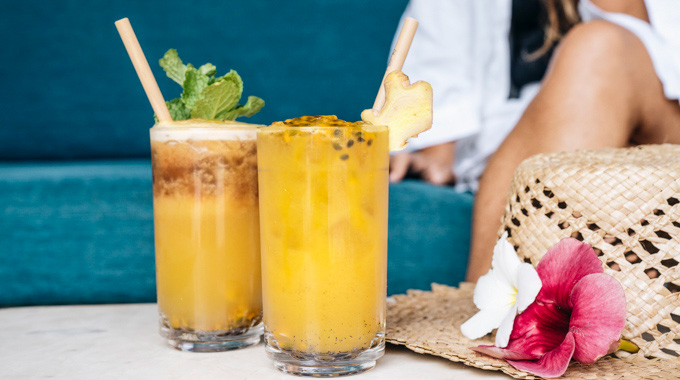 A pair of cocktails: Mai tai and Wailea Flow with liliko'i