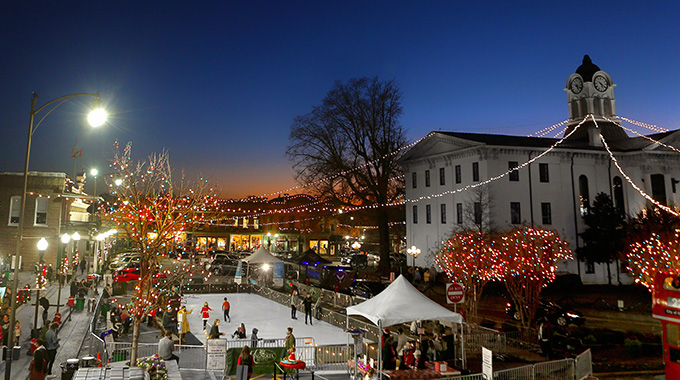 A canopy of lights emanates from Oxford’s courthouse, lending a festive atmosphere to December’s Holly Jolly Holidays celebration that includes carriage rides, ice skating, and shopping. | Photo courtesy Visit Oxford