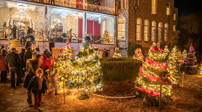 A sparkling Christmas Tree Forest decorates the grounds at the 1886 Crescent Hotel and Spa during the holidays. | Photo courtesy Purdy Art Company