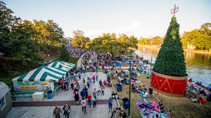 Crowds along the Natchitoches Riverbank during the annual Christmas Festival