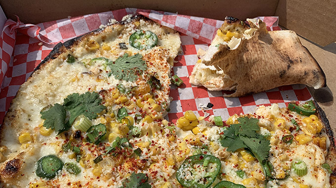 The Rolling Stonebaker in Valparaiso produces award-winning wood-fired pies with unusual toppings—the Get That Corn Out of My Face! pizza features the ingredients of elote, or Mexican grilled corn. | Photo by Fran Golden
