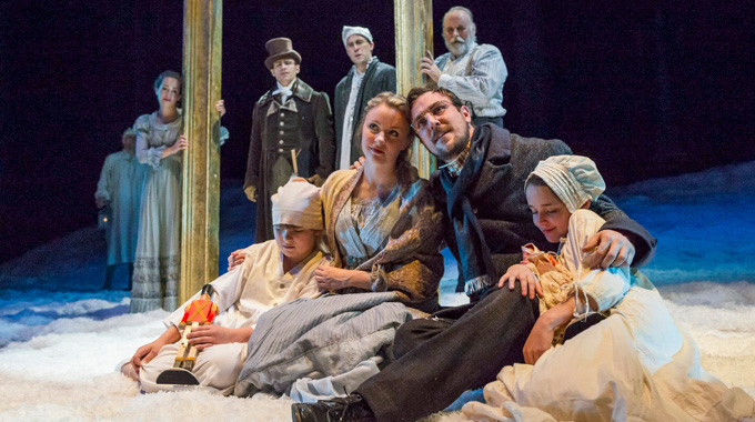 The cast of "A Christmas Carol" onstage at Indiana Repertory Theatre