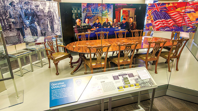Among the exhibits at the Dwight D. Eisenhower Presidential Library, Museum, and Boyhood Home is the table around which Eisenhower and other Allied commanders planned the D-Day invasion. 